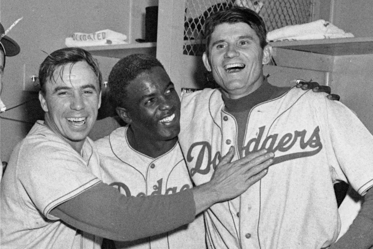 Picture of Jackie Robinson and Pee Wee Reese. During the time when Robinson  first joined the Dodgers Reese was one of the few who treated him like  everyone else. : r/baseball