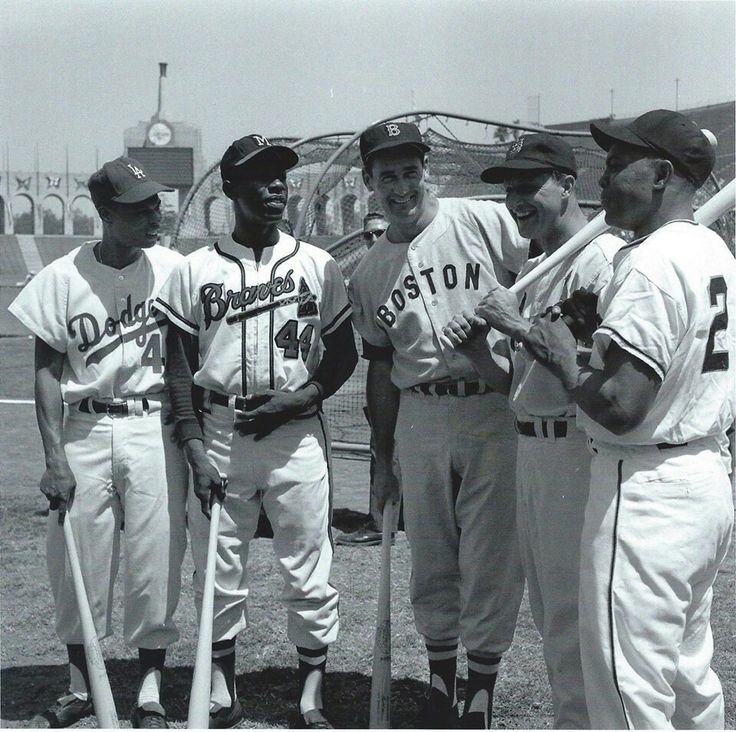 Hank Aaron And Tom House Shaking Hands by Bettmann