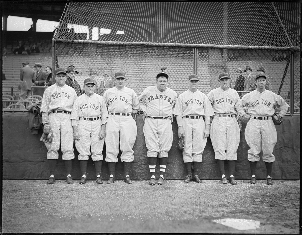 Babe Ruth, Boston Braves baseball player, standing in a dugout