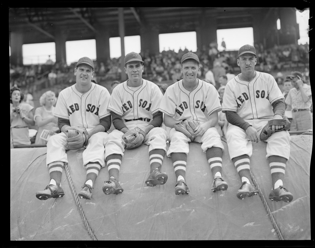 Members of the Red Sox 1946 pennant-winning team await their introductions  in the dugout: Includes Johnny Pesky (2d from right), May 18, 1986