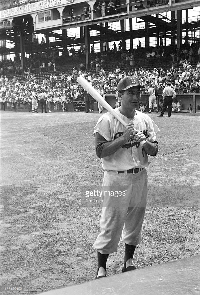 Pee Wee Reese poses with Pete Reiser at Ebbets Field in Brooklyn in 1949.