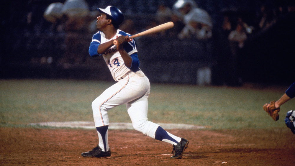 Hank Aaron And Tom House Shaking Hands by Bettmann