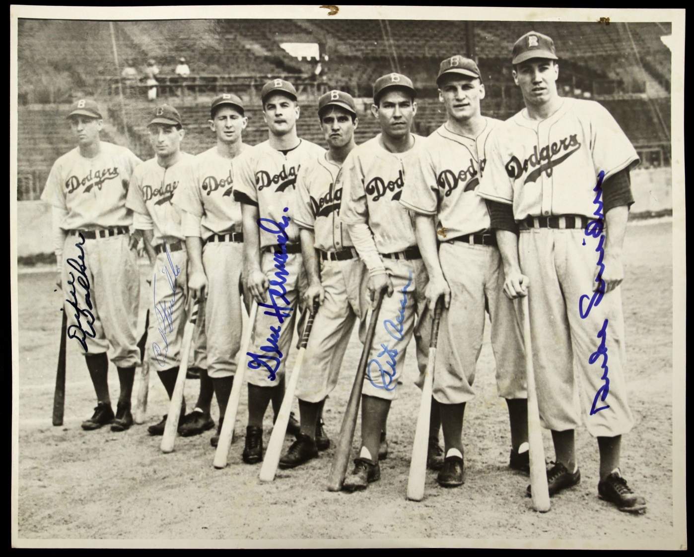 Pee Wee Reese poses with Pete Reiser at Ebbets Field in Brooklyn in 1949.