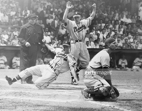 Ernie Banks Sliding Safely Into Home by Bettmann