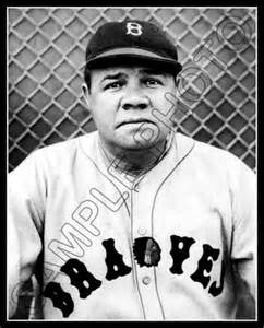 Babe Ruth as a Boston Brave poses with Red Sox players