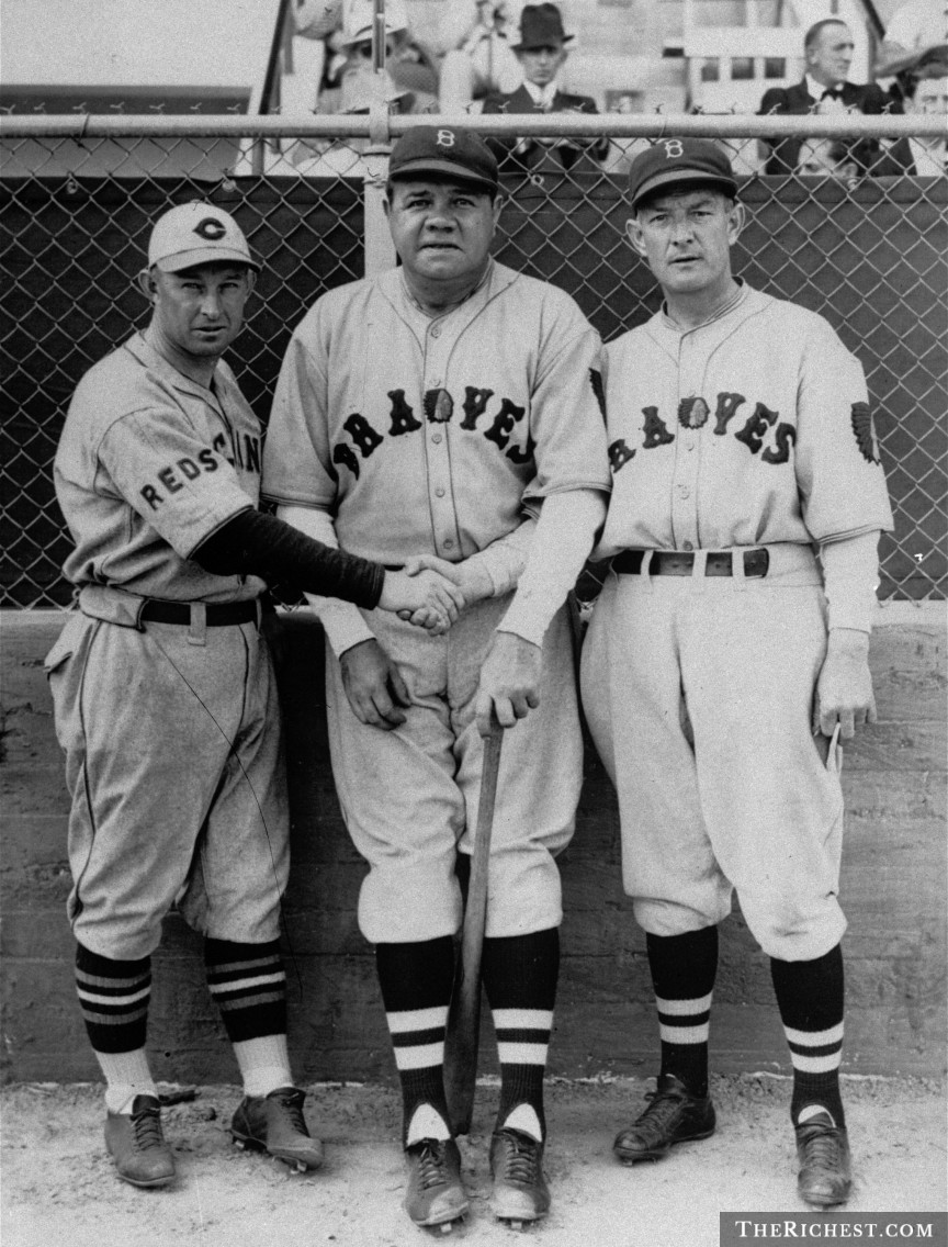 Babe Ruth as a Boston Brave poses with Red Sox players