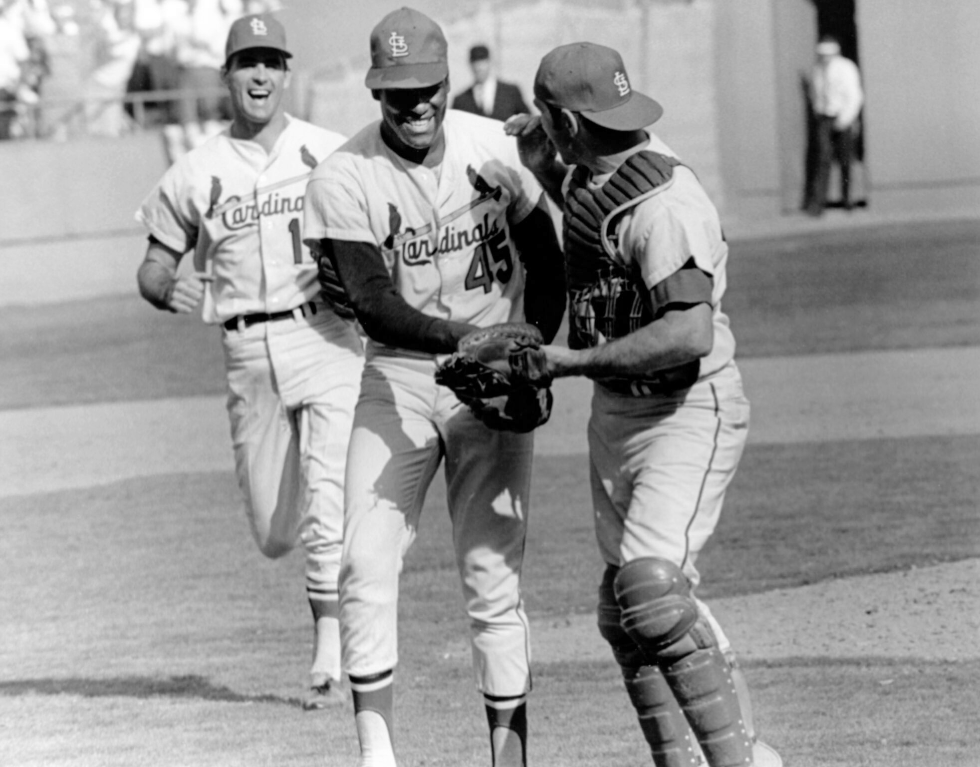 Baseball In Pics - Dick Groat and Bob Gibson celebrate winning the