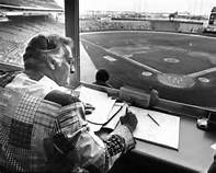 Baseball In Pics - Bob Uecker shagging flyballs with a tuba prior