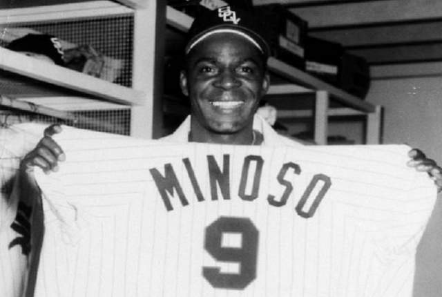 Chicago White Sox outfielder Orestes Minnie Minoso smiles as he poses in  Tampa, Fla., on March 9, 1957. Minoso, whose hometown is Marianao, Cuba,  became the first black player with the White