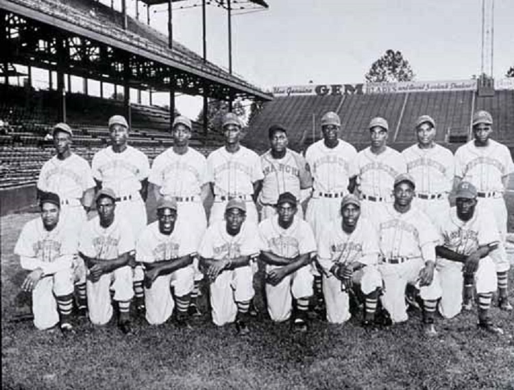 Jackie Robinson in Kansas City Monarchs uniform Poster by American