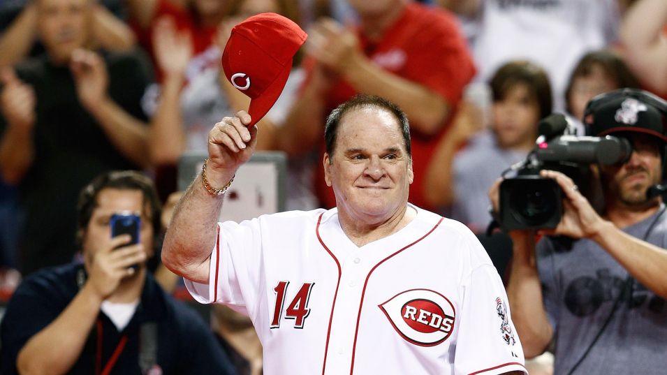 Former Cincinnati Reds great Pete Rose stands with his grandson Pete Rose  III, front, and sons Tyler Rose, left, and Pete Rose Jr., center, during  ceremonies celebrating the 25th anniversary of Rose