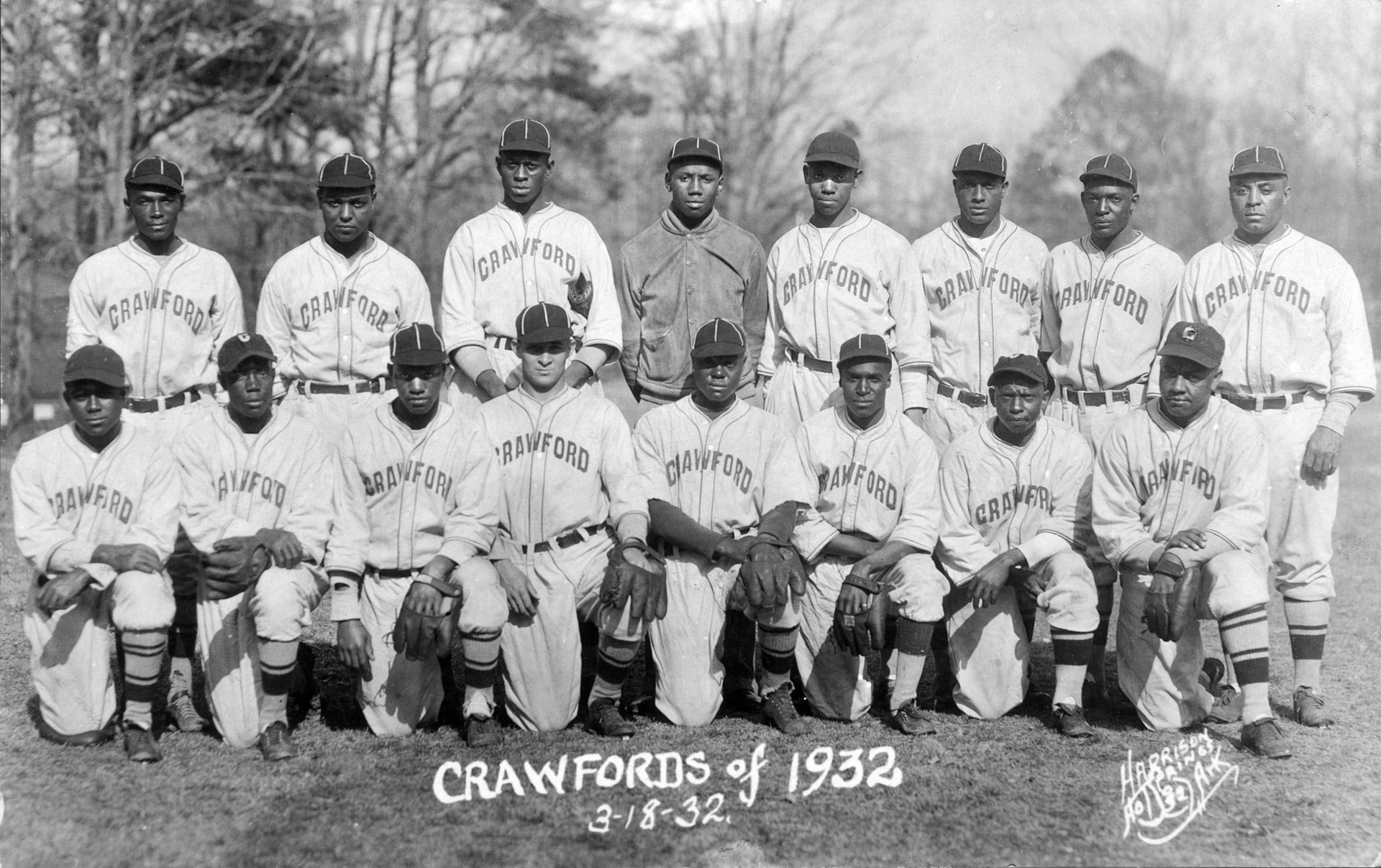 BASEBALL: NEGRO LEAGUES. /n'Cool Papa' Bell (front row, center), 'Satchel'  Paige (middle, far right), Josh Gibson (back, far left) and other members  of an American Negro Leagues All-Star team which participated in