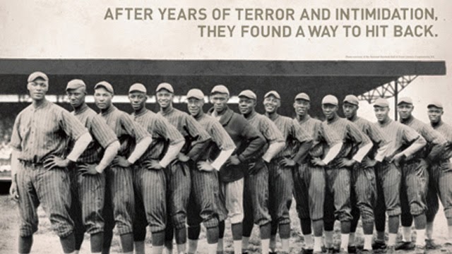 The 1932 Pittsburgh Crawfords, featuring 3 of the greatest players ever: Satchel  Paige is standing third from the left, Josh Gibson is standing next to Paige  and wearing a jacket, and Oscar