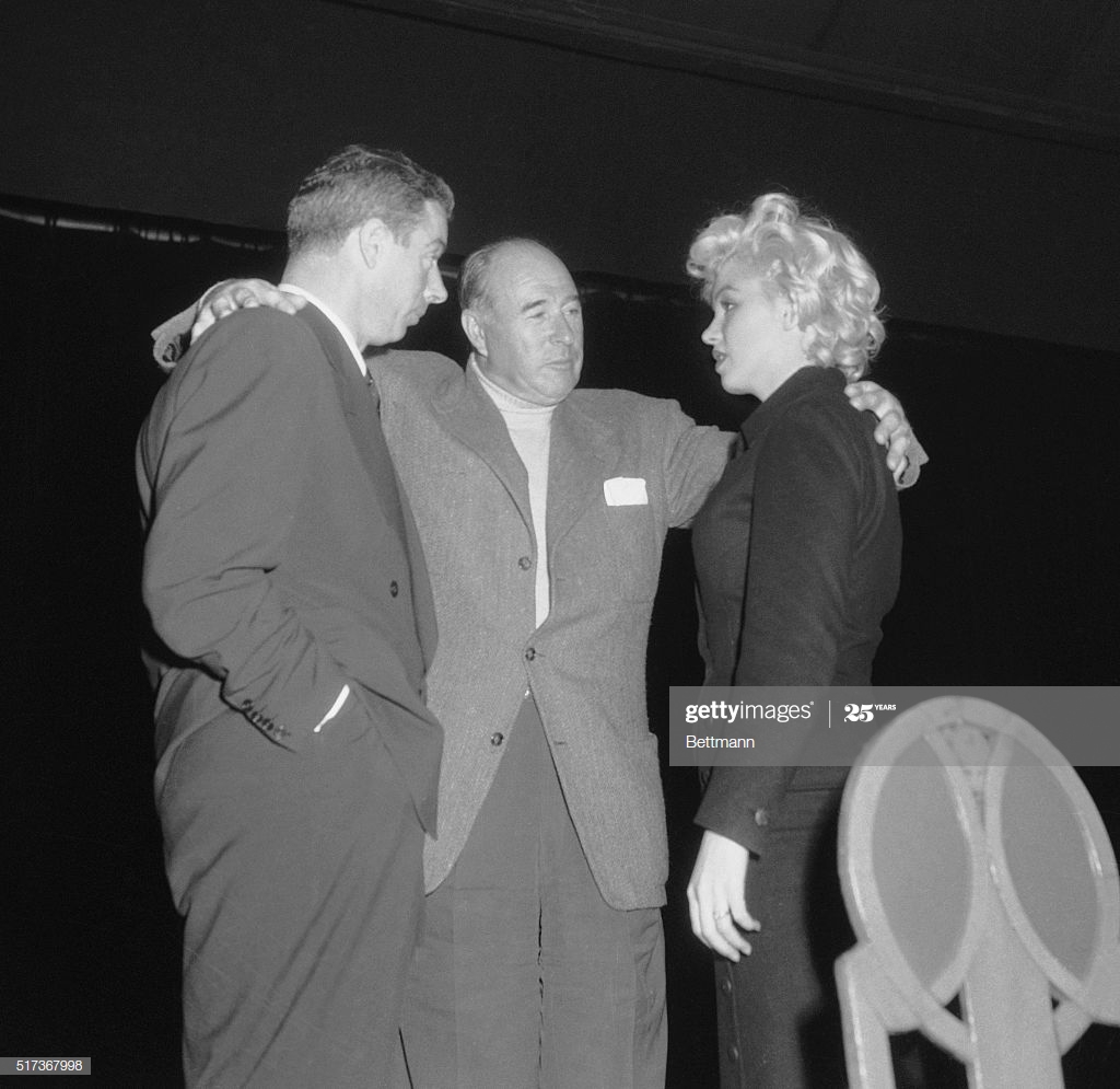 (Original Caption) Marilyn Monroe with husband Joe Dimaggio and Lefty O ...