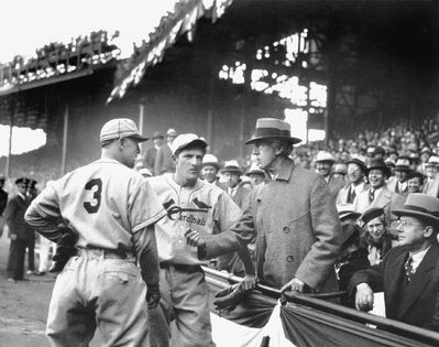 Judge Landis removes Medwick from 1937 World Series Game “for his own safety.”